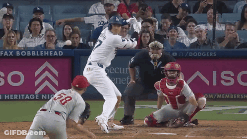 A Baseball Game Is Being Played In Front Of An Aisc Ad GIF