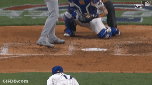 A Baseball Game Is Being Played With A Globe Life Ad In The Background GIF