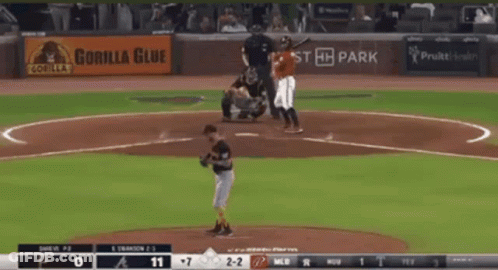 A Baseball Game Is Being Played With A Gorilla Glue Ad In The Background GIF