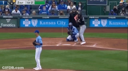 A Baseball Game Is Being Played With A Kansas City Banner In The Outfield GIF