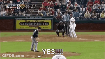 A Baseball Game Is Being Played With A Sign That Says Cabinets In The Background GIF