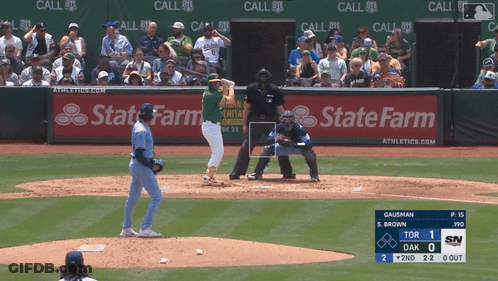 A Baseball Game Is Being Played With A State Farm Ad In The Outfield GIF