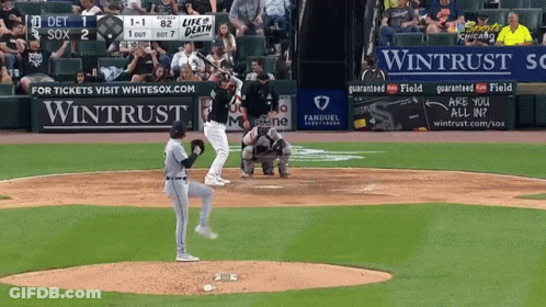 A Baseball Game Is Being Played With A Wintrust Ad In The Outfield GIF