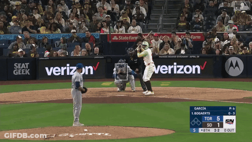 A Baseball Game Is Being Played With Advertisements For Verizon And Seat Geek GIF