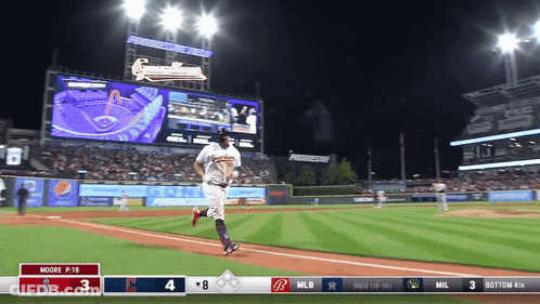 A Baseball Game Is Underway And The Scoreboard Shows That The Angels Are Leading The Indians 4 To 3 GIF