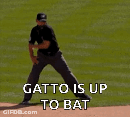 A Baseball Pitcher Is Getting Ready To Throw The Ball And The Words " Gatto Is Up To Bat " Are Visible GIF