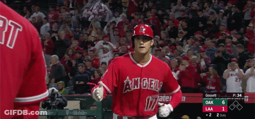 A Baseball Player For The Angels Runs Towards The Dugout GIF