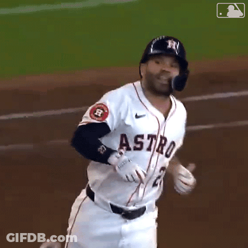 A Baseball Player For The Astros Is Running Across The Field GIF