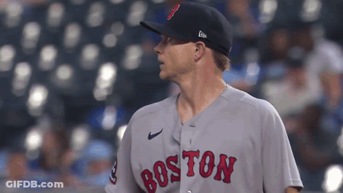 A Baseball Player For The Boston Red Sox Looks To His Right GIF