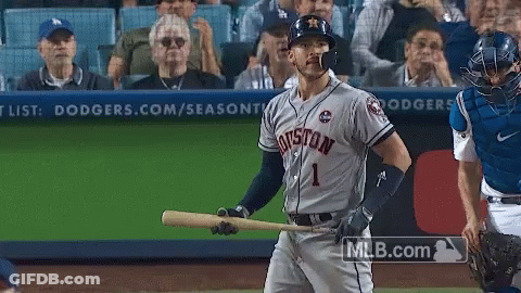 A Baseball Player For The Houston Astros Holds A Bat GIF
