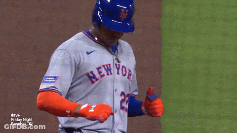 A Baseball Player For The New York Mets Is Giving A Thumbs Up . GIF
