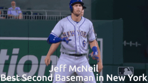 A Baseball Player For The New York Mets Stands On The Field GIF