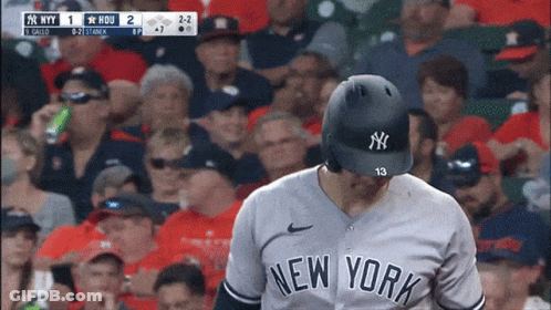 A Baseball Player For The New York Yankees Is Looking Down GIF