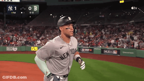 A Baseball Player For The New York Yankees Runs On The Field During A Game GIF
