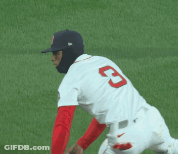 A Baseball Player For The Red Sox Wearing A Mask And Glove GIF
