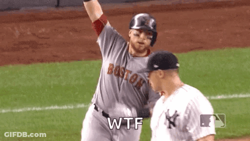 A Baseball Player From The Boston Red Sox Is Standing Next To Another Player On The Field . GIF