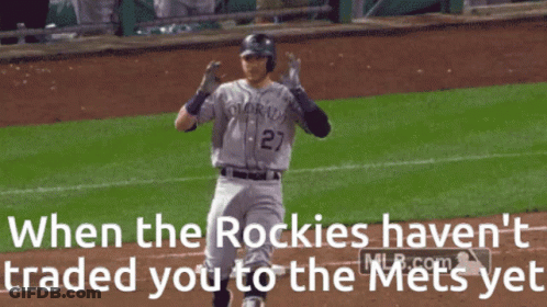 A Baseball Player From The Colorado Rockies Holds His Head In His Hands GIF