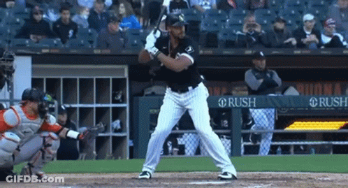 A Baseball Player Getting Ready To Hit The Ball With A Banner In The Background That Says Rush GIF