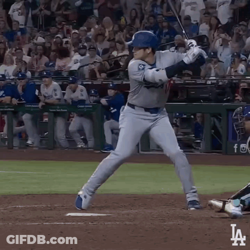 A Baseball Player Getting Ready To Swing At A Pitch With The La Logo In The Corner GIF