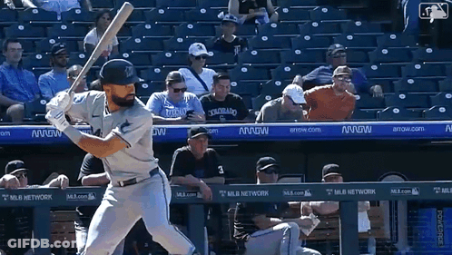 A Baseball Player Getting Ready To Swing His Bat In Front Of A MLB Network Banner GIF
