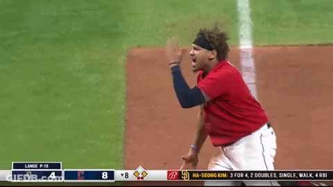 A Baseball Player Giving The Middle Finger In Front Of The Scoreboard GIF