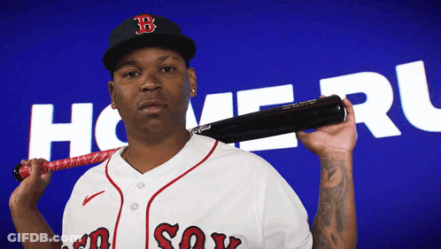 A Baseball Player Holding A Bat In Front Of A Blue Background With The Word Homer On It GIF