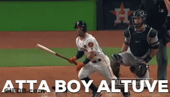 A Baseball Player Holding A Bat With The Words Atta Boy Altuve Written On The Bottom GIF