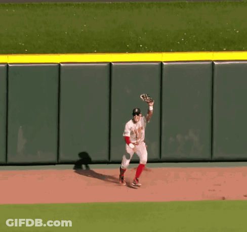 A Baseball Player In A Boston Uniform Is Running On The Field GIF