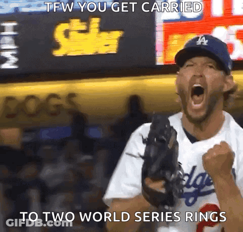 A Baseball Player In A Dodgers Uniform Is Celebrating A Win GIF