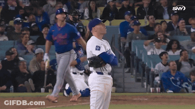 A Baseball Player In A Dodgers Uniform Looks Up At The Sky GIF