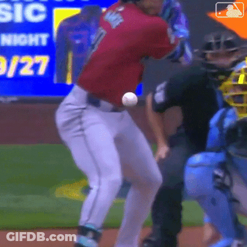 A Baseball Player In A Red Shirt With The Number 7 On The Back GIF