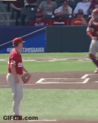 A Baseball Player In A Red Uniform With The Number 59 On The Back GIF