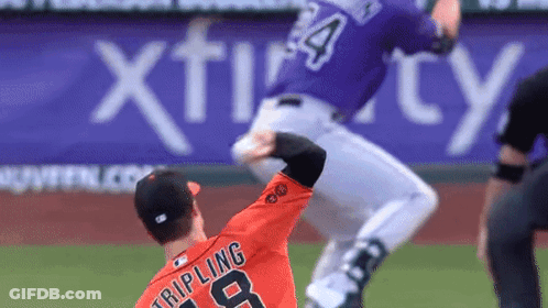 A Baseball Player In An Orange Jersey With The Number 8 On The Back GIF