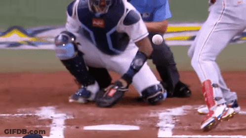 A Baseball Player Is Getting Ready To Hit A Ball GIF