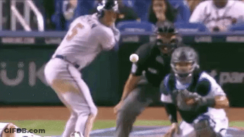 A Baseball Player Is Getting Ready To Throw A Ball While A Catcher Watches . GIF