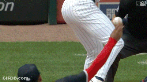 A Baseball Player Is Getting Ready To Throw The Ball While Another Player Watches GIF