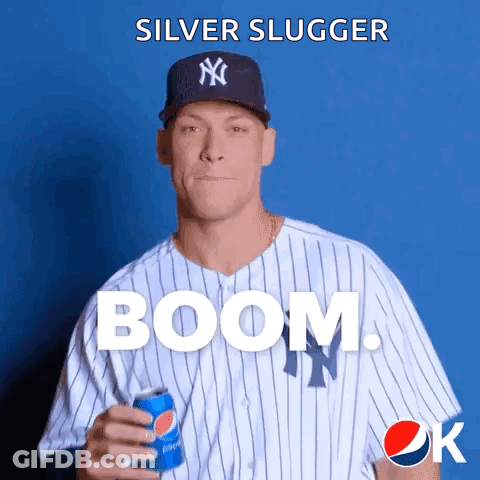 A Baseball Player Is Holding A Can Of Pepsi In His Hand GIF