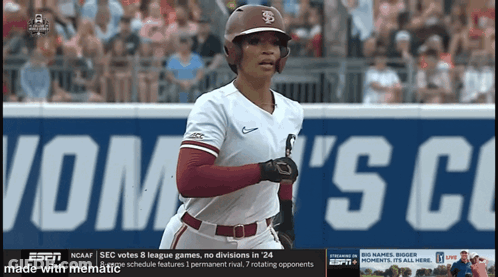 A Baseball Player Is Running In Front Of A Sign That Says ' Sec Votes 8 League Games ' GIF