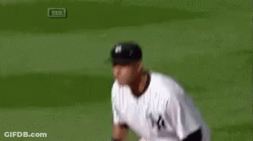 A Baseball Player Is Running On A Field While Wearing A Ny Yankees Uniform . GIF
