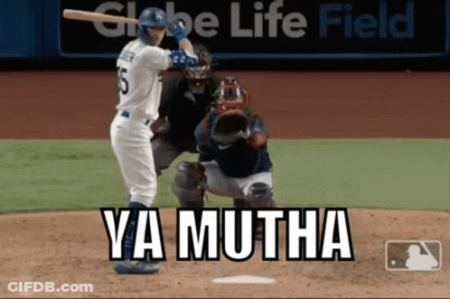 A Baseball Player Is Swinging A Bat At A Ball While A Catcher Looks On . GIF