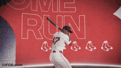 A Baseball Player Is Swinging A Bat In Front Of A Sign That Says " Come Run " GIF