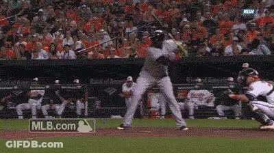 A Baseball Player Is Swinging His Bat At A Pitch While A Mlb.com Logo Is Visible In The Background GIF