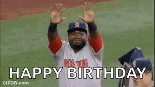 A Baseball Player Is Waving His Hands In The Air While Wearing A Red Sox Jersey . GIF