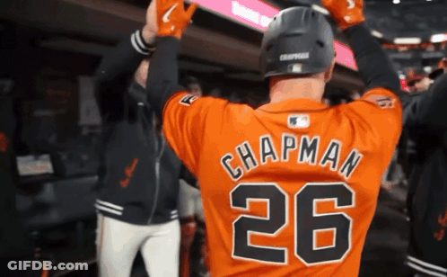 A Baseball Player Named Chapman Is Wearing A Number 26 Jersey GIF