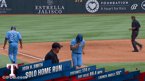 A Baseball Player Named Josh H. Smith Is Running To First Base GIF