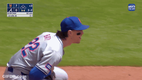 A Baseball Player Named Quintana Is On The Field During A Game GIF