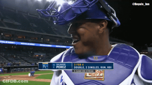 A Baseball Player Named Salvador Perez Is Wearing A Catcher 'S Chest Guard GIF
