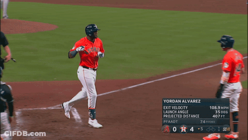 A Baseball Player Named Yordan Alvarez Is Running Towards The Base GIF