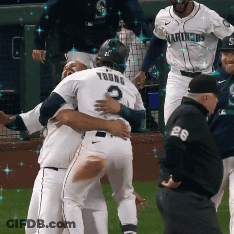 A Baseball Player Named Young Is Hugging Another Player GIF