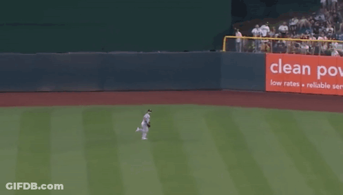 A Baseball Player Runs Towards A Clean Power Sign GIF